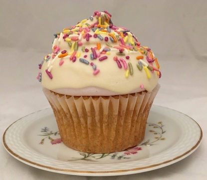 Medium double vanilla birthday cupcake